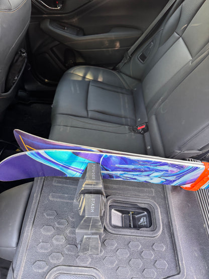 Powder Stash slots holding skis for tuning